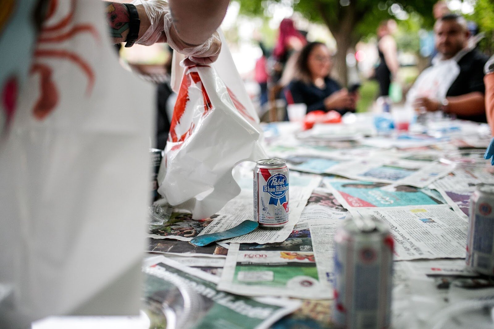 An ice-cold PBR rests on a table during Porch Fest on Friday, July 15, 2022. (Jenifer Veloso | Flintside)