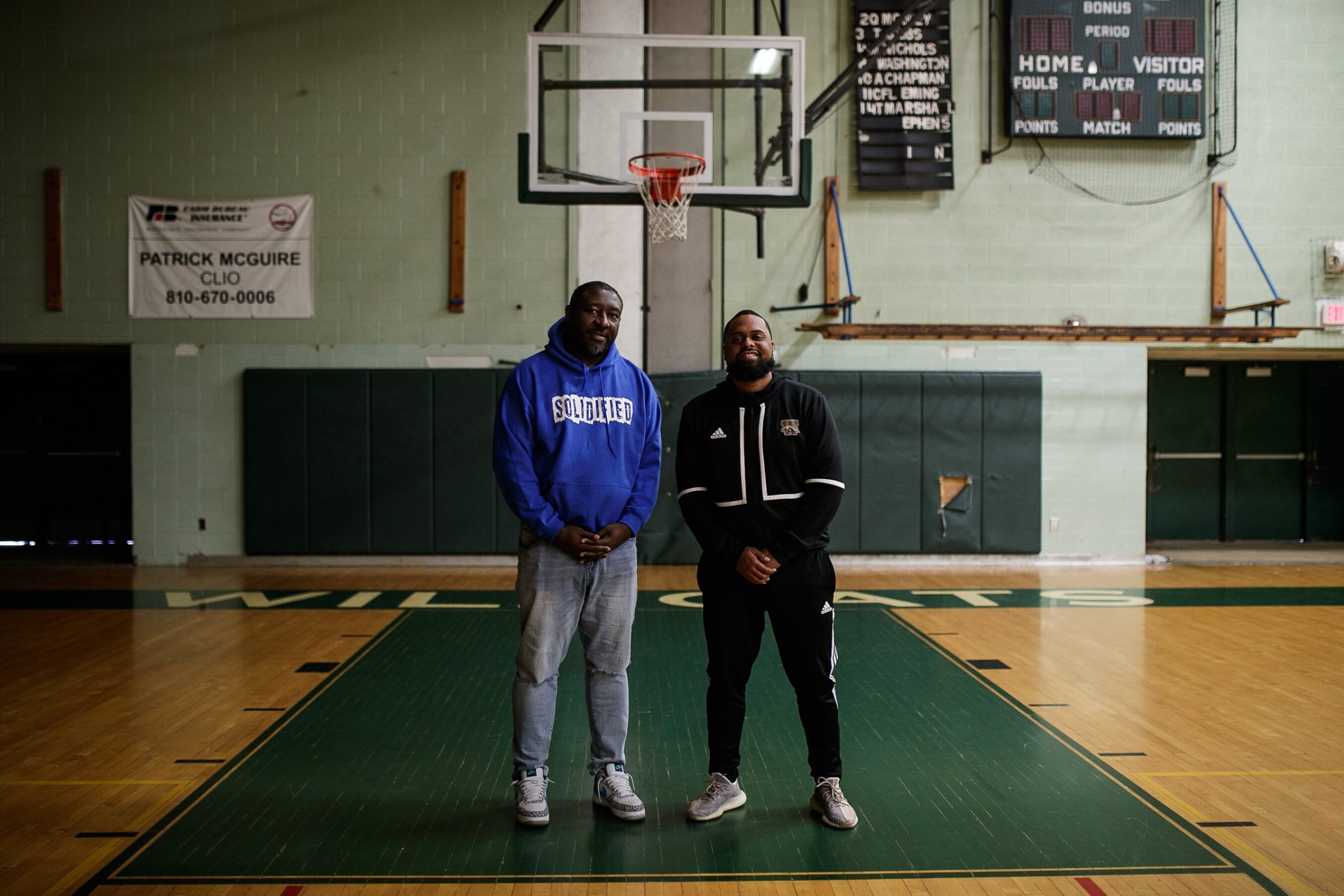 Kelvin Torbert and Eric Woodyard inside of Flint Northwestern's gymnasium.