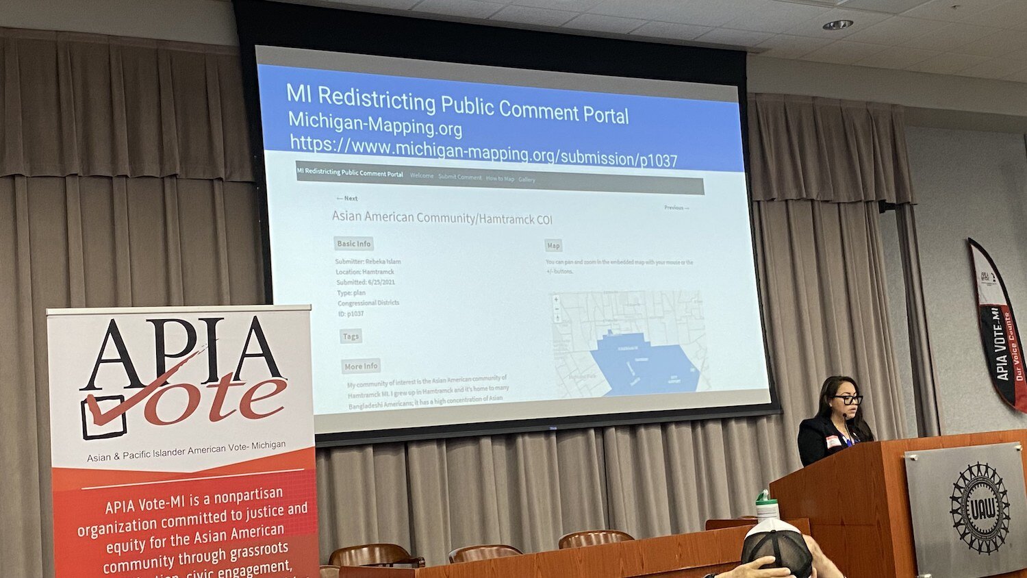 Loida Topia from MNA instructing community members on how to use the map portal at a town hall meeting hosted by APIA Vote-MI, July 07, 2021