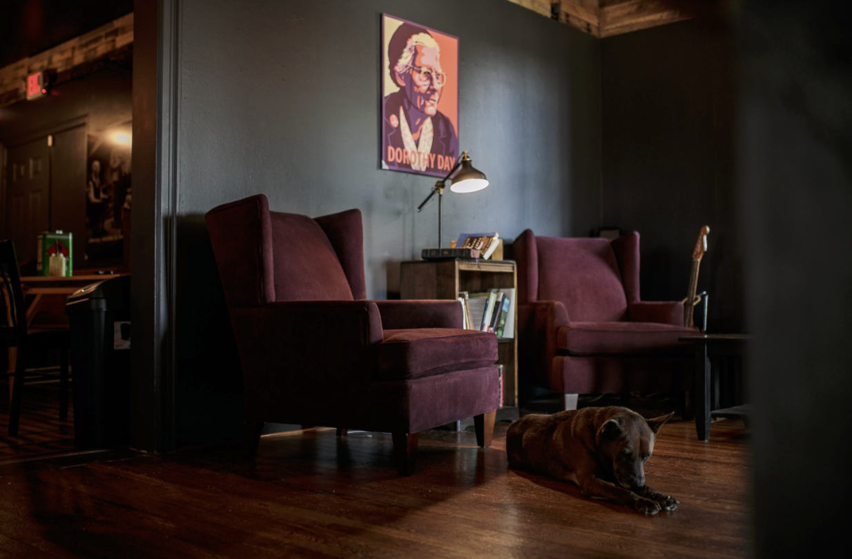 Pictures and paintings of Dorothy Day fill the corners and walls of Dorothy Day's Coffee House in East Village.