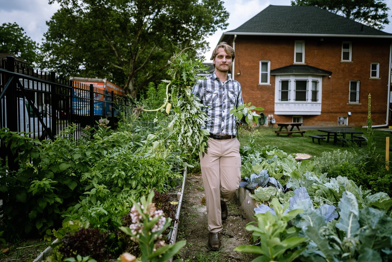 John Peterson in AIHFS' garden.