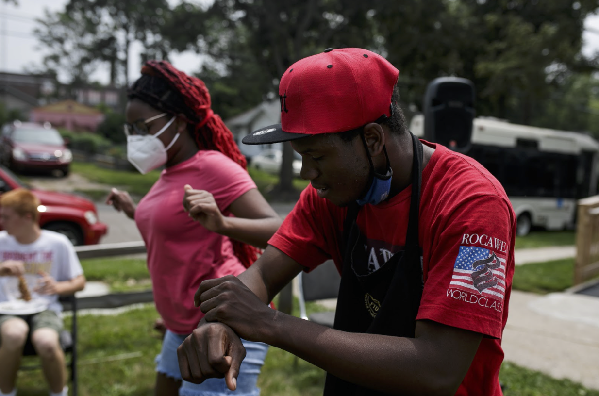 Students from Asbury Church's Sizzlin' Culture program danced and cooked for residents during a craft fair July 24.