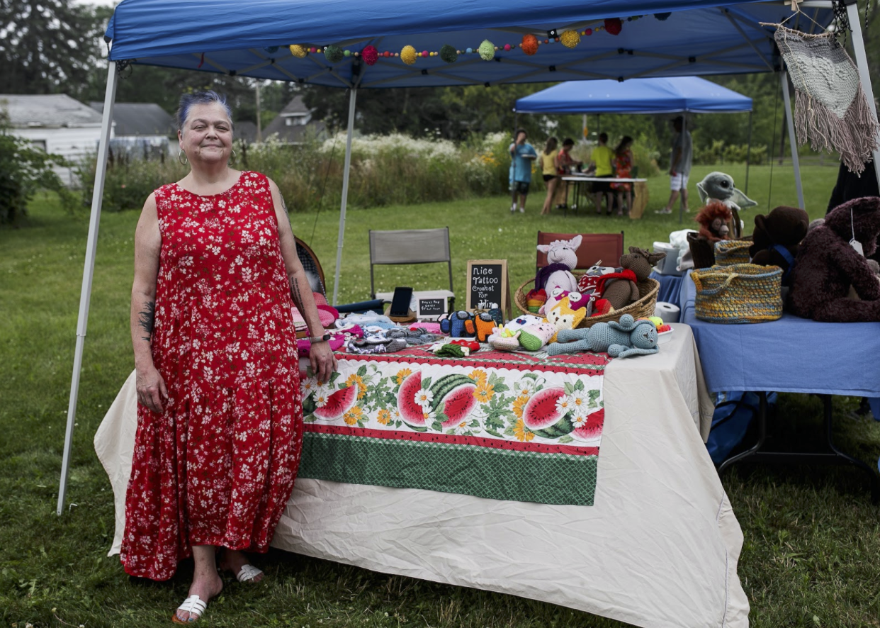 Flint resident Martha Allard displays her crafts during Eastside Franklin Park's neighborhood event on July 24.