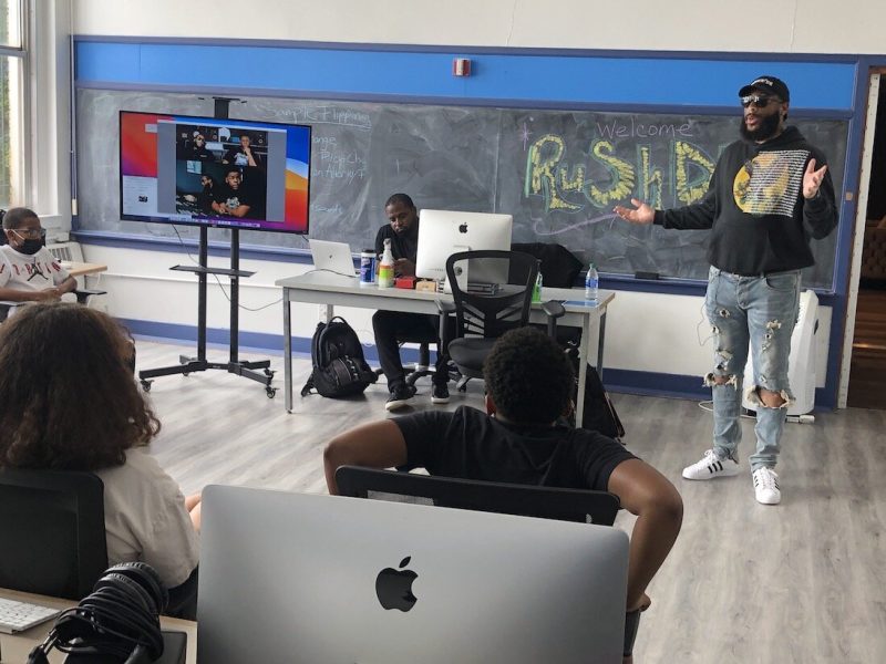 RushDee did a Q and A session with students as part of a visit to Flint's Sylvester Broome Empowerment Village on July 8-9.