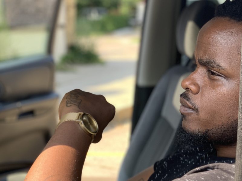 Mixon-Webster is profoundly himself appearing before me with uncombed hair, a box of Newports, dressed in all black, covered in tattoos, wearing a gold Rolex on the one hand and a black braided bracelet on the other.