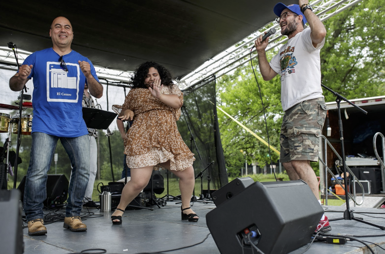 Community members danced on stage with the band during the 20th anniversary of the Latinx Technology Center.