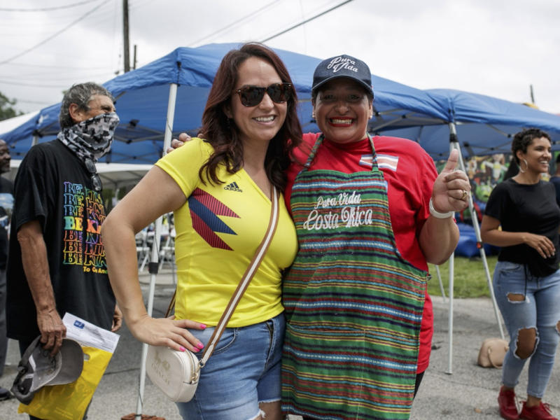 Sheyla McLain (right) poses for a photo with a Colombian friend at the 20th anniversary of the Latinx Technology Center.