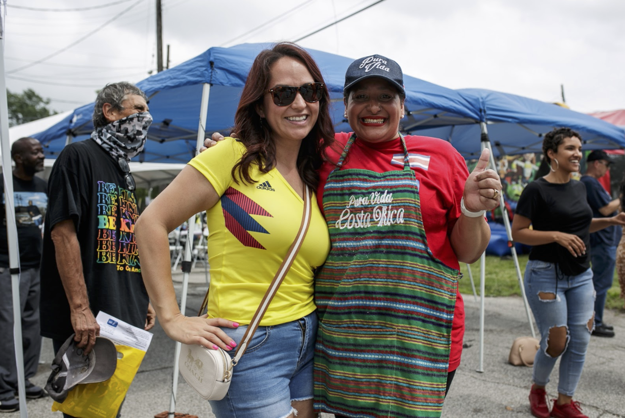 Sheyla McLain (right) poses for a photo with a Colombian friend at the 20th anniversary of the Latinx Technology Center.