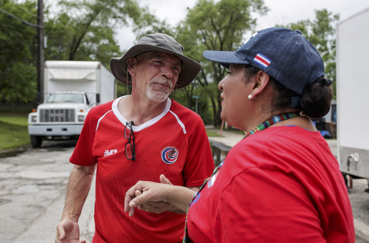 Sheyla McLain and her husband dance at the 20th anniversary of the Latinx Technology Center