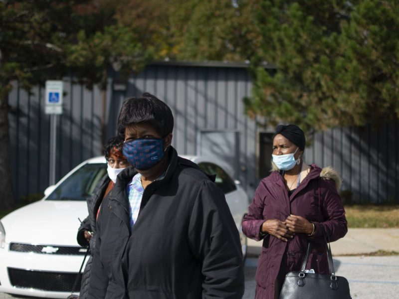 Birtie Forster (left), Lily Holbrook (center) and Louise Sampson (right) walk out of Hasselbring Senior Center after spending part of the morning together socializing.