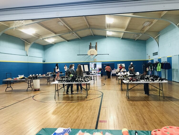 A sports gear giveaway at the Kinross Recreation Center.