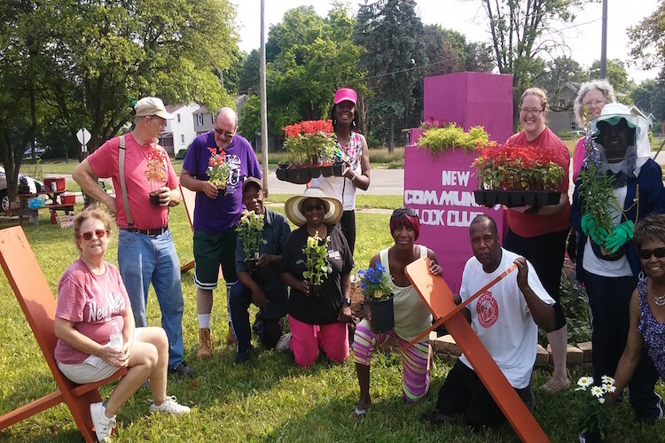 Local groups like block clubs maintain vacant lots held by the Land Bank. Each group is responsible for maintaining at least 25 lots throughout the growing season.