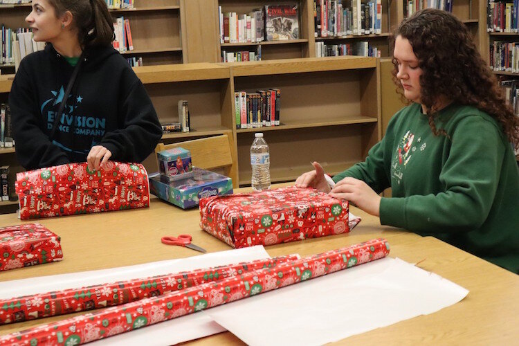 The Bentley holiday party on Dec. 12 allowed parents a free evening to do their holiday shopping and have those gifts wrapped by participating high school students.  