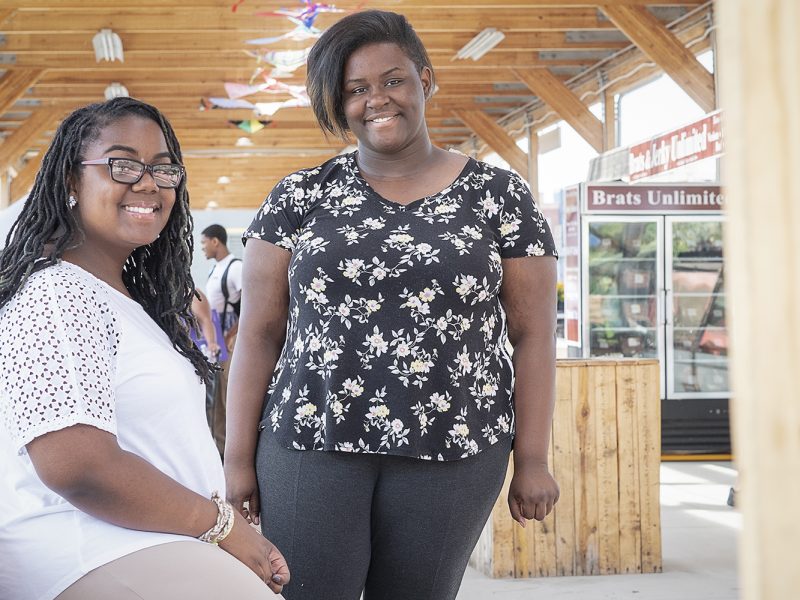 Flint, MI - Thursday, June 7, 2018: Raven Hullum, 14, (left) and Erin Long, 17, creators of Loving Me Inc., have their photograph taken at the Flint Farmers' Market downtown.