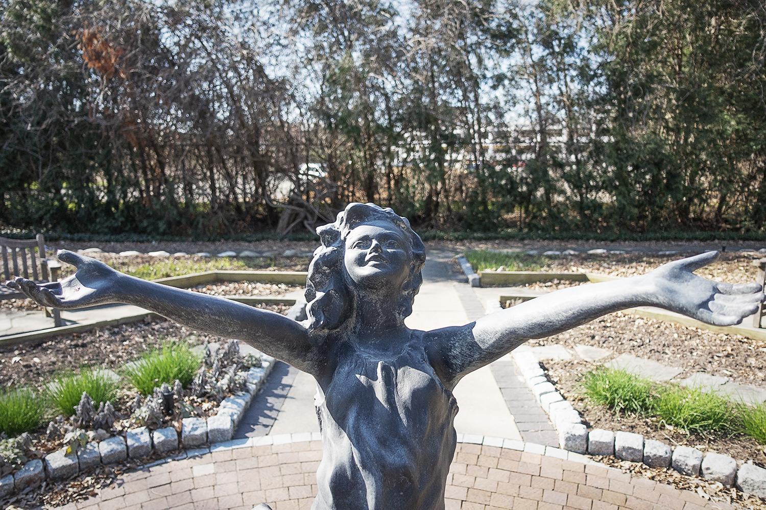 The La Brezza statue in the lower garden of the Applewood Estate greets visitors much as Ruth Mott greeted her friends and family at her 90th birthday. The statue was given to Mott on her 95th birthday because of its resemblance to her 90th birthday 