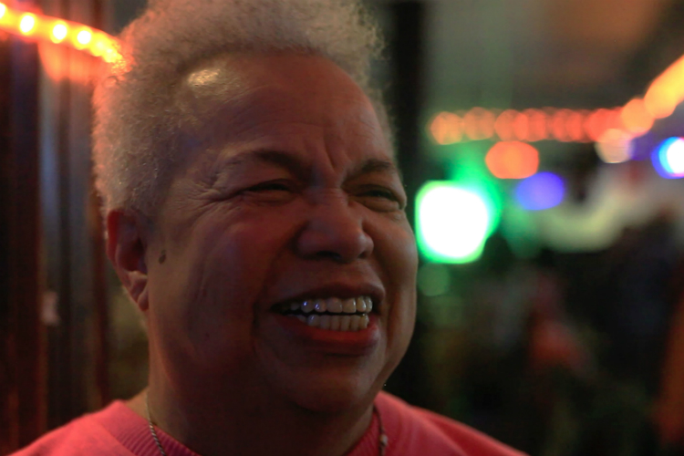 Lottie Reid serves as both the owner and maitre’d at The Golden Leaf, a storied club where jazz nights keep Flint's musical traditions alive.