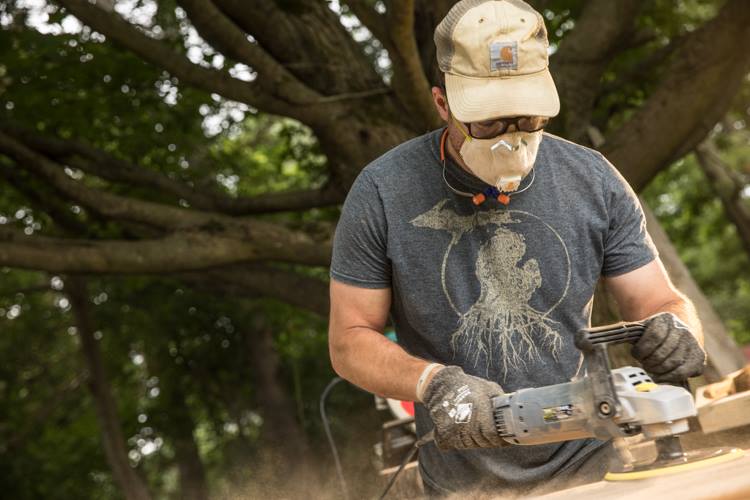 Mark Hoffman and business partner Tom Jones officially established Tomahawk Reclaimed Lumber Company in the last year to make furniture out of old, unwanted, and/or discarded wood.