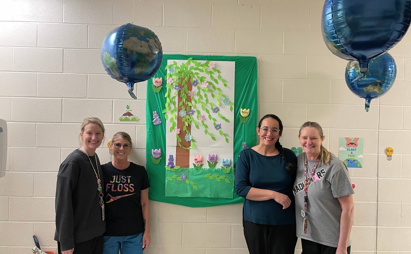 The Cincinnati Health Department dental team, from right to left: Kelsey McClanahan (CDA), Joan Cox (CDA), Dr. Anna Novais, and Tricia Waddell (EFDA).