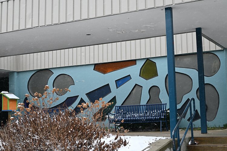 The notable glass stain windows are still intact on the building that was home to Bunche Elementary School for nearly 45 years. Taken on March 13, 2023. (Tia Scott | Flintside)