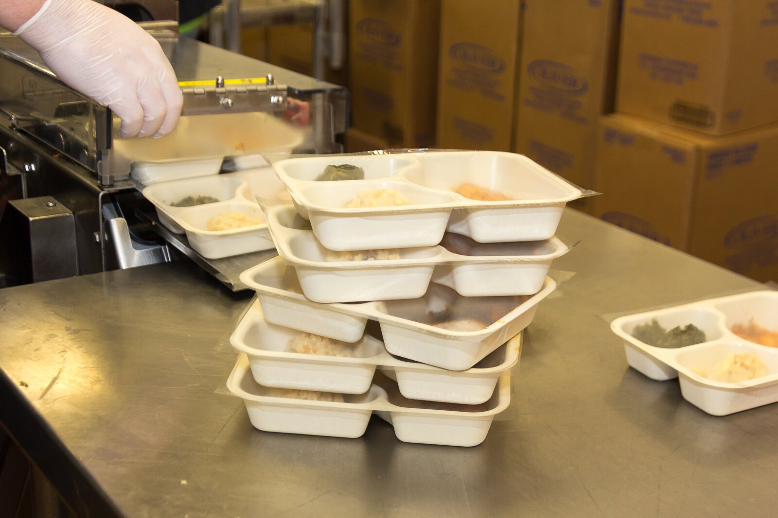 Volunteers at Senior Services Southwest Michigan prepare meals for delivery.