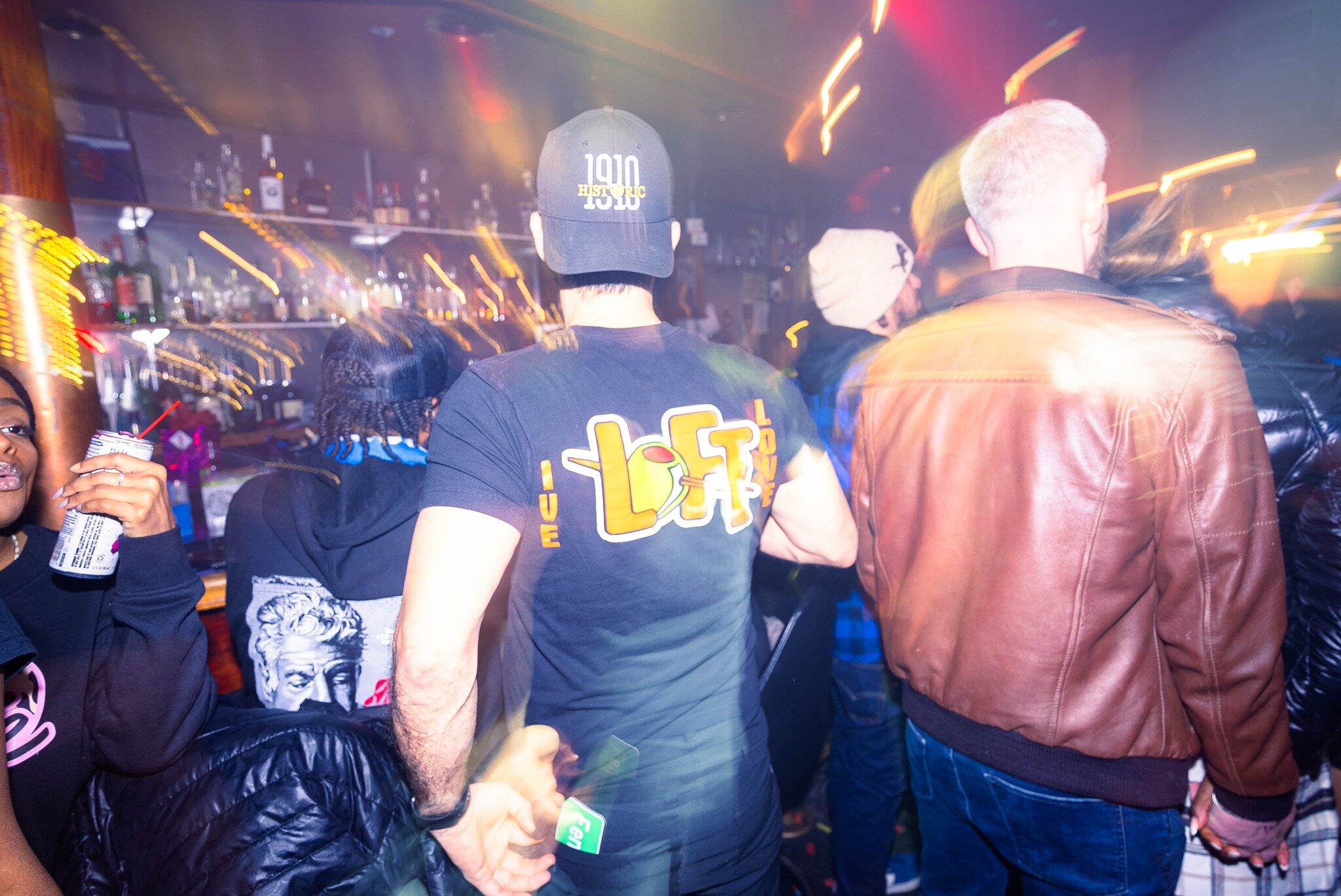 Patrons adorn official Loft merch on The Loft's final night on Saturday, Jan. 18, 2025.