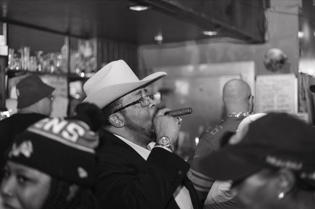 A patron puffs a cigar on the final night at The Loft in downtown Flint on Saturday, Jan. 18, 2025.