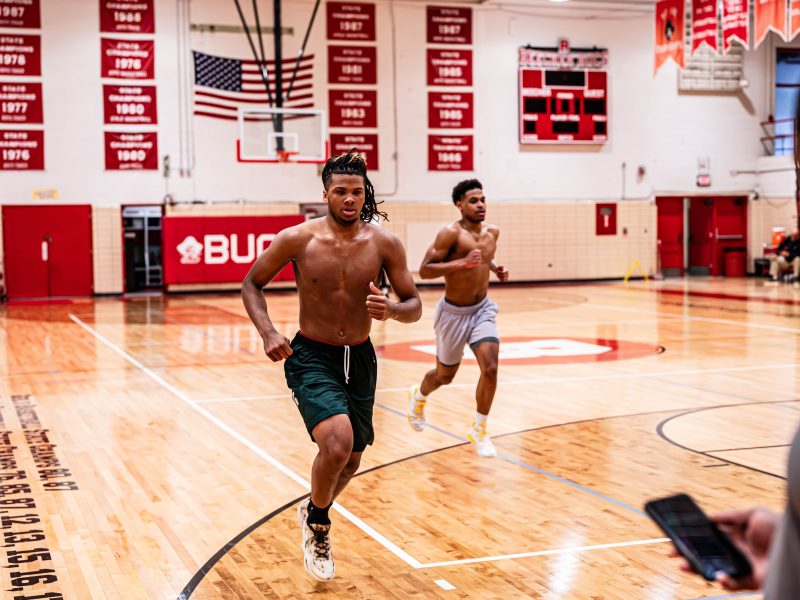 Flint native Trey McKenney (left) works on speed drills with fellow teammate Phoenix Marble (right).