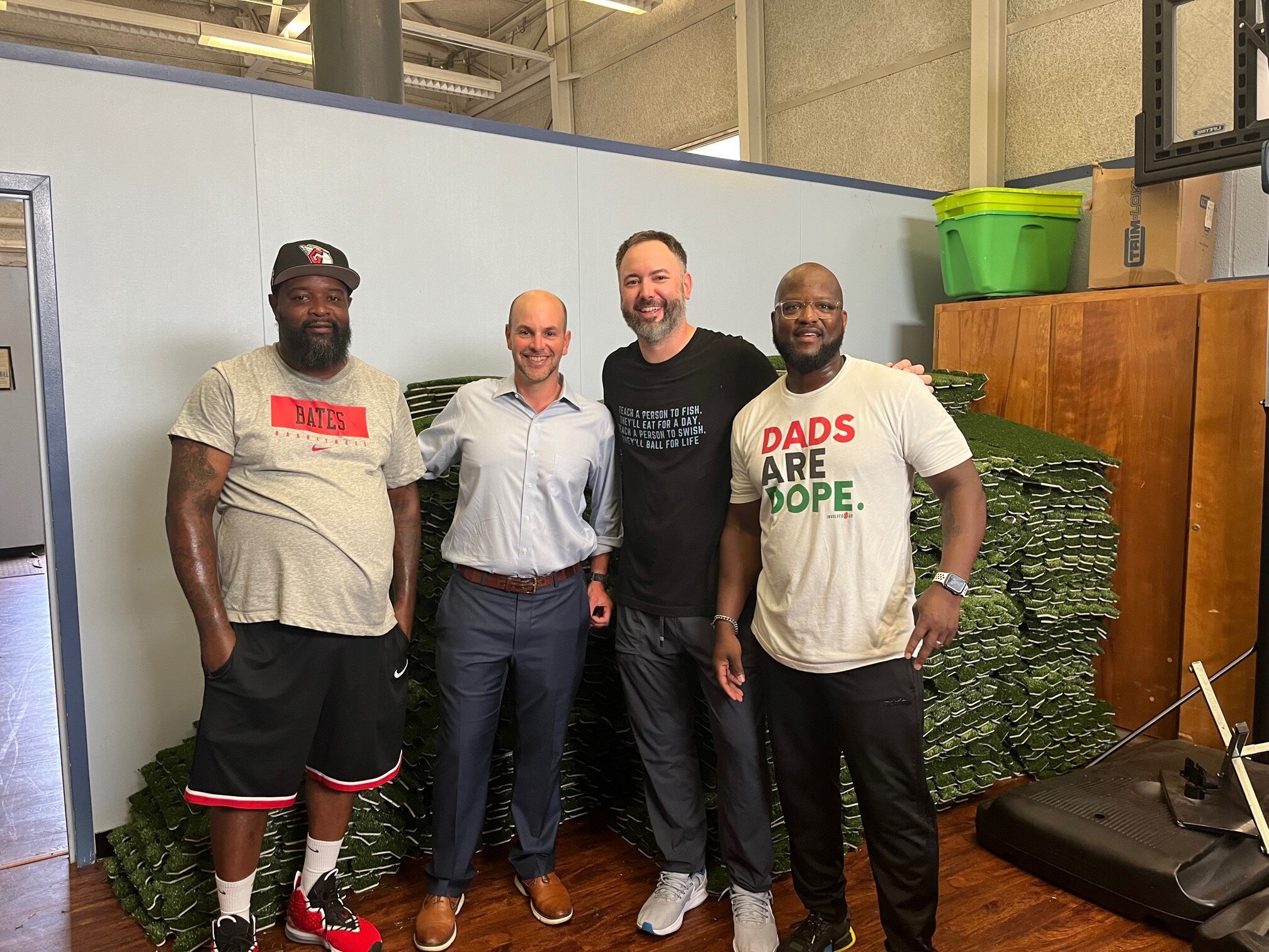 Diante Lyles of Flint Flames Youth Basketball Organization, Ridgway White of CS Mott Foundation, Steve Wolbert of SIPI, and Shon Hart of Involved Dad at the Flint Development Center.