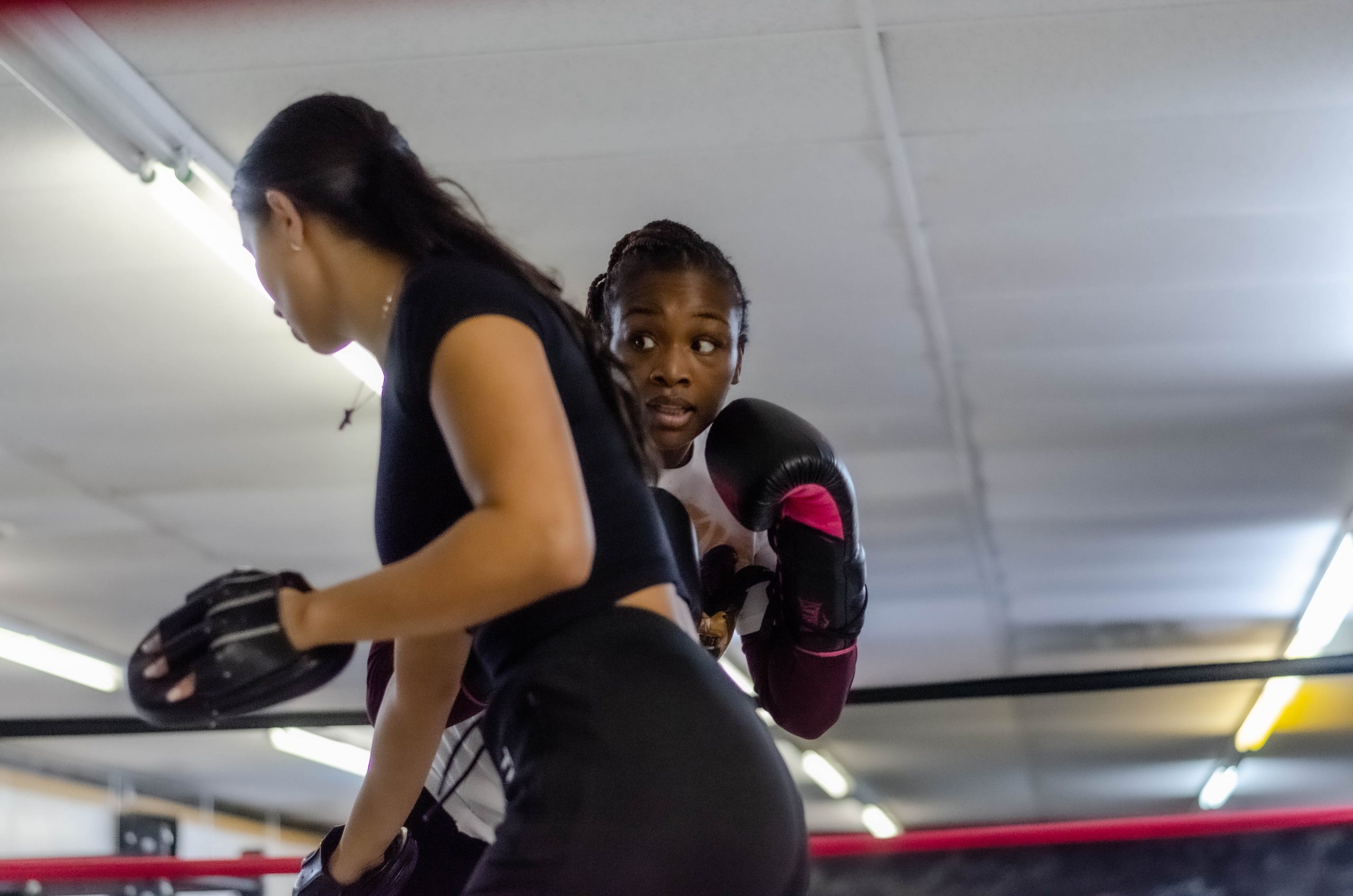 Claressa Shields spars with a participant during her free boxing class held on Monday, Jan. 9, 2023. (Rayford Gray | Flintside)