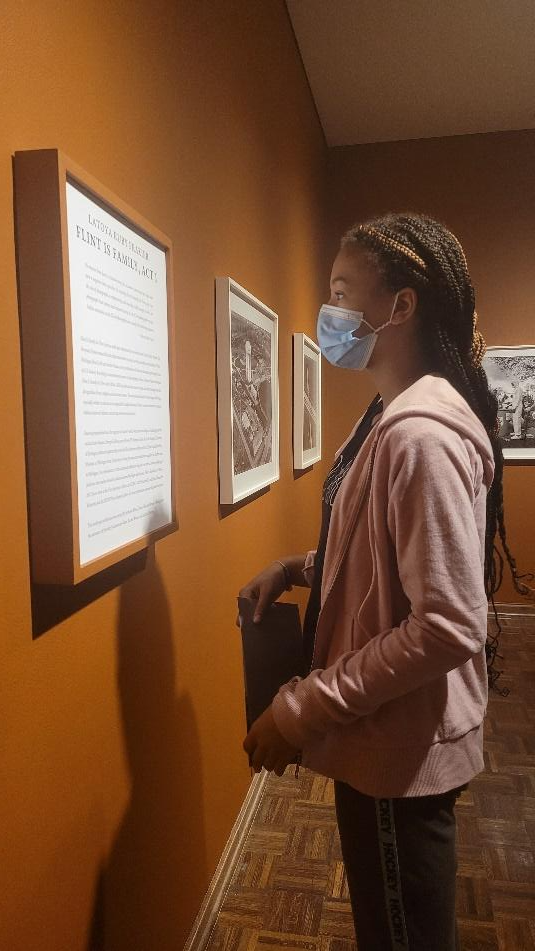 Flint youth Aniya C. visits 'Flint Is Family, Act 1' at the Flint Institute of Arts. 