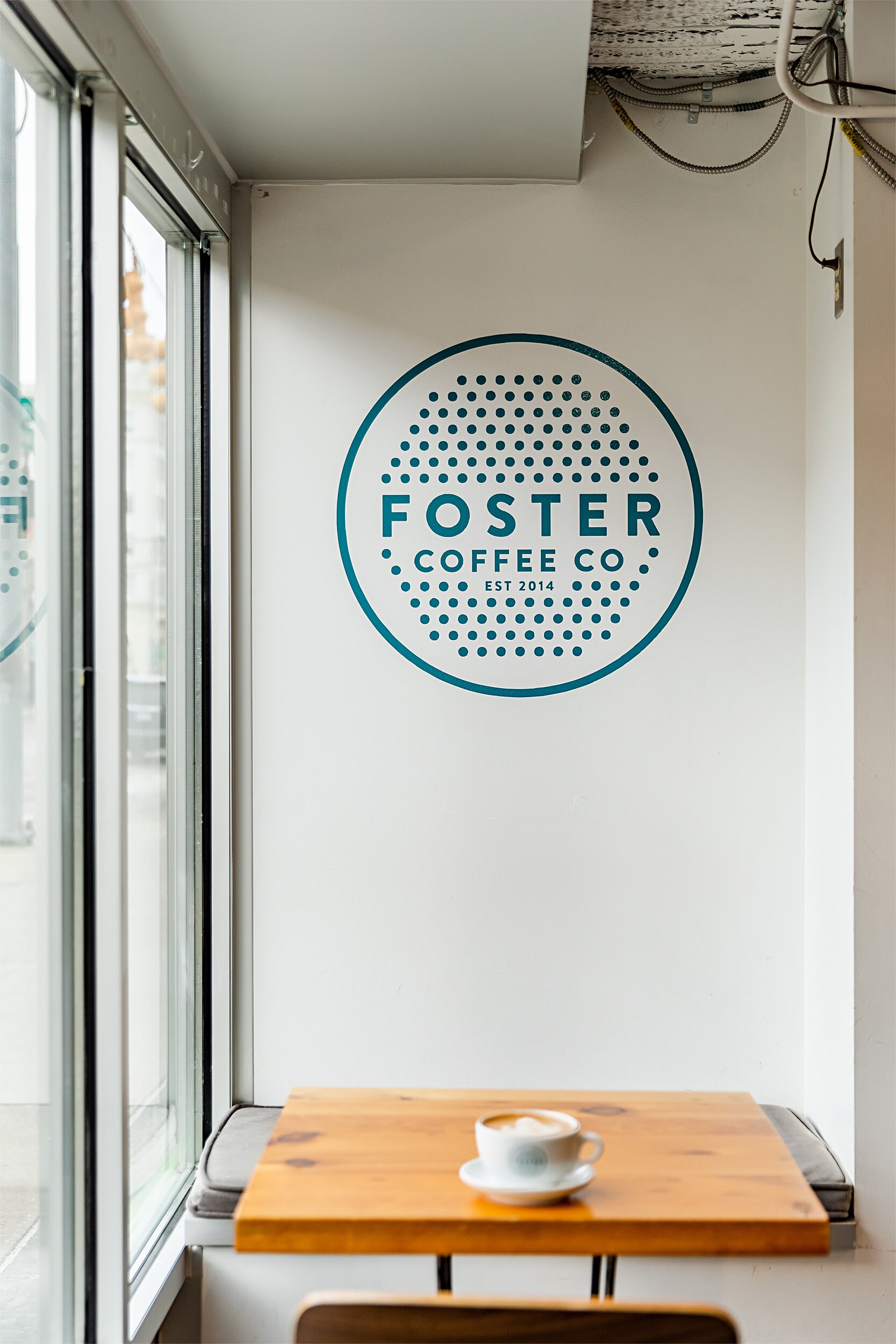 A cozy nook inside Foster Coffee's cafe area.