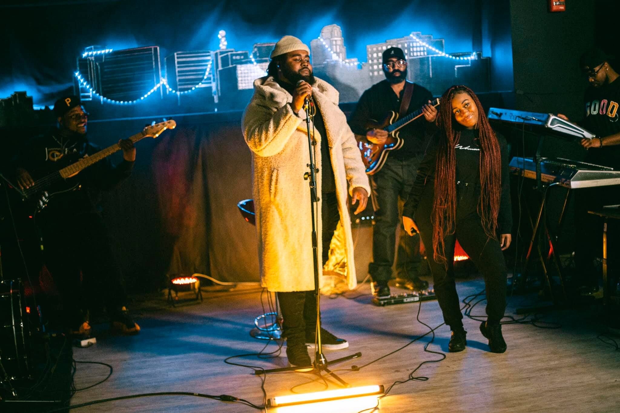 Local musicians Rashaad Reed (left) and Brelia Renee (right) during a live performance at Flint Local 432.