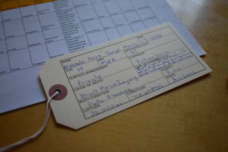 1 of 3,200 handwritten toe tags of immigrants that are featured in the Hostile Terrain 94 (HT94) exhibition.