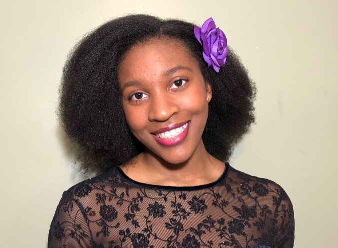 Anne-Marie Atanga, a Genesee Early College graduate, was honored by Genesee Health Plan for her essay.