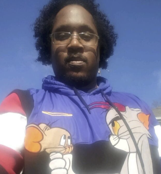 Corey Bands, 37, the owner of clothing business and music record label, “Money by the Minute.”