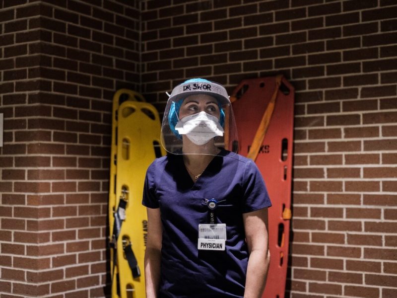 Veloso photographed nurses, doctors, environmental services workers, first responders, EMTs, and police officers in the series.