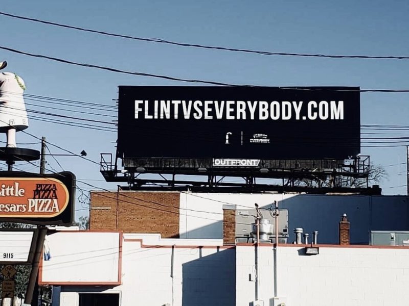 A FLINT VS EVERYBODY billboard on Ballenger Highway.