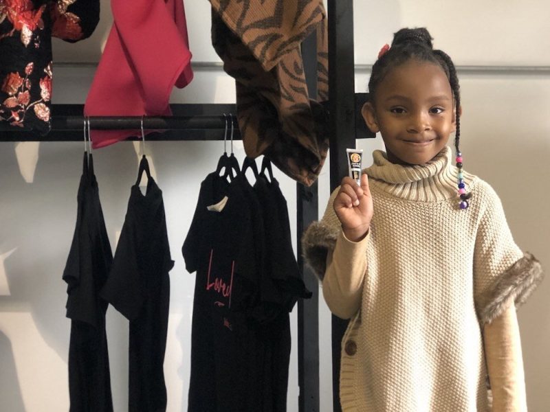 Jada Wilburn showing off some of the lip gloss she created.