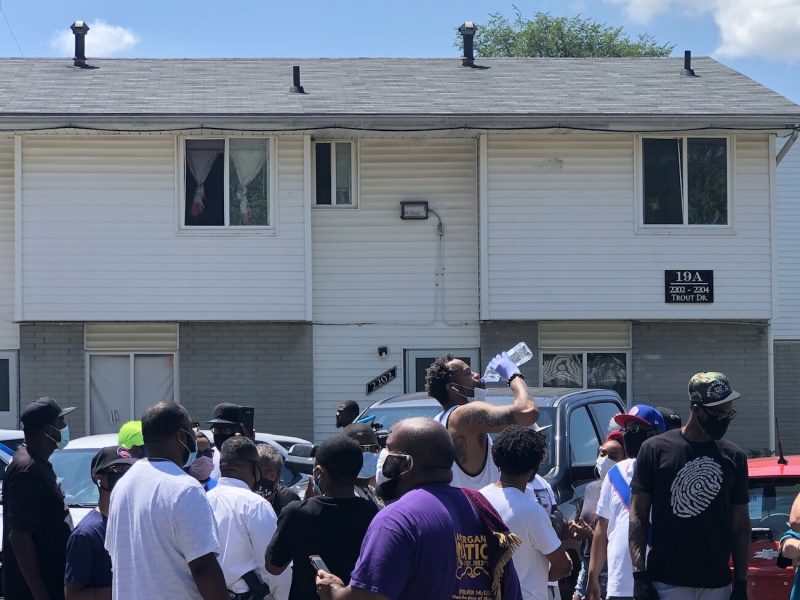 Rasheed Wallace takes a water break while distributing food and water to residents at Evergreen Regency Estates.