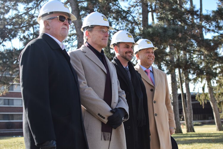 (Left to right ) Board of Trustees Member Gary Cowger, Kettering University President Robert McMahan, President of the C.S Mott Foundation Ridgway White, and Flint Mayor Sheldon Neeley stand together after breaking ground.