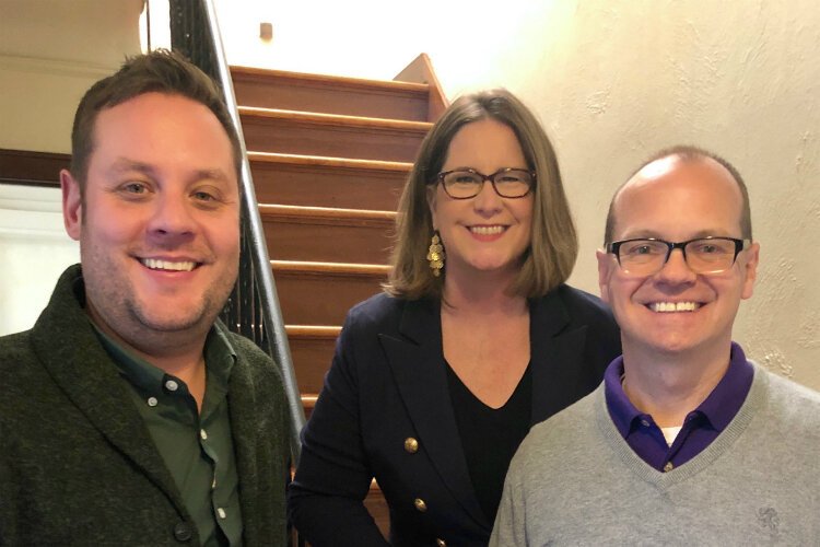 Realtor Jonathan Schlinker (left) helped Mundy Township residents Matt and Katie Bach in their search for a home in Flint.