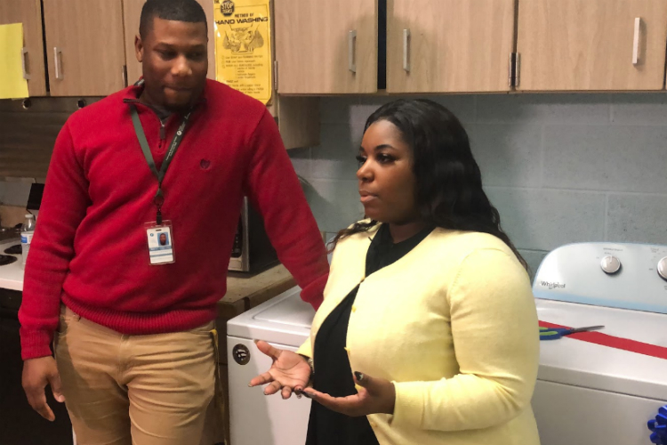 Community School Director Chris Collins and Chia Morgan from Well of Hope talk about the importance of access to a washer and dryer for families.