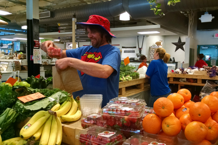 Vendors also get into the spirit duirng the semi annual Flint Comix Con at the Flint Farmers' Market.