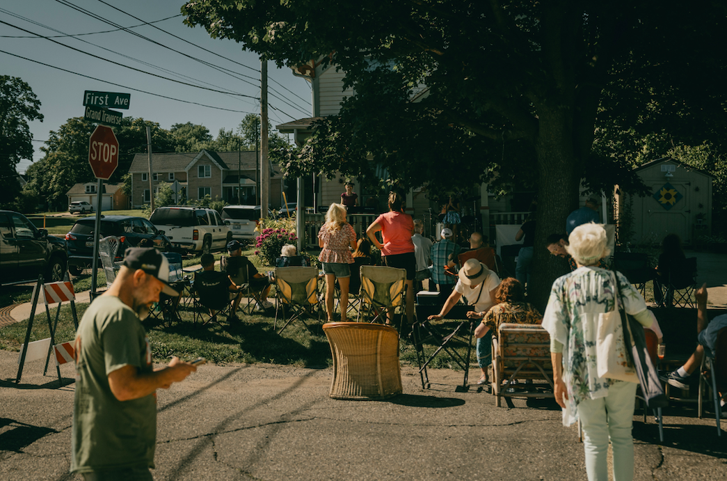 Community members gather around for Porch Fest on July 18, 2025.