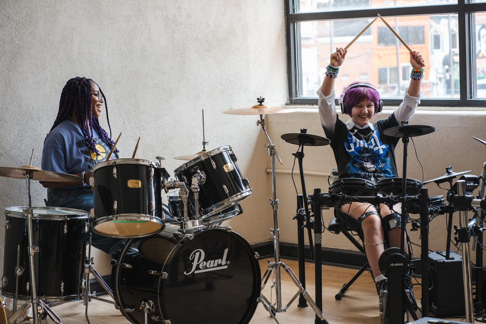 Flint youth are excited about making their bands, writing songs, and learning how to play instruments at FRYE Music Camp.